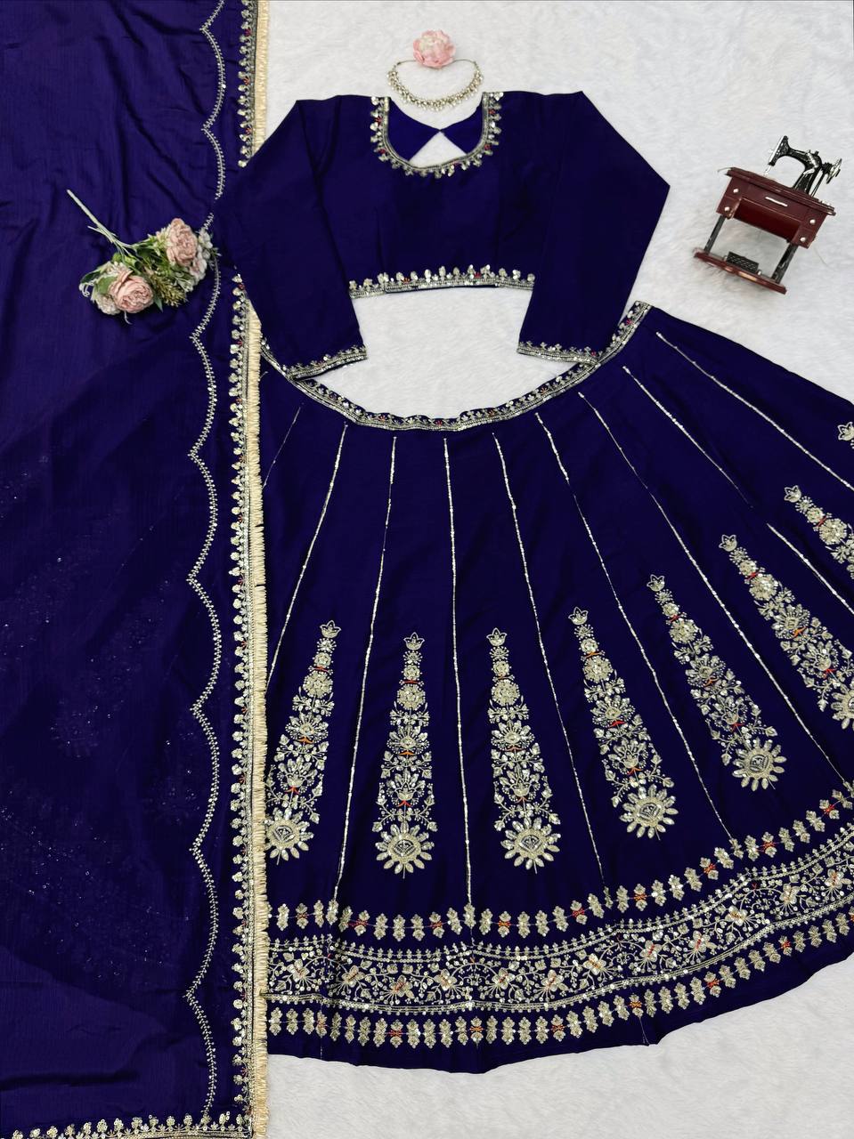 Radiant Rani Pink Silk Lehenga Choli Adorned with Opulent Heritage Floral Motifs and Intricate Zari Borders